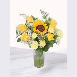 Sunflower + yellow carnation + baby's breath + lining leaves and vase