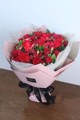 Red rose + small red rose + seasonal flowers